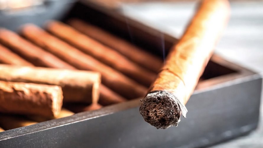 open box of Cuban cigars on display